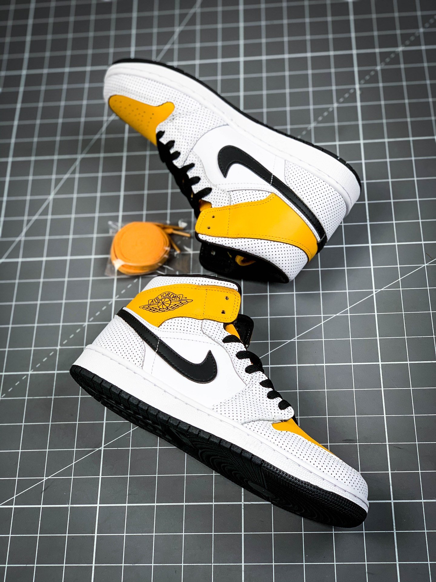 Air Jordan 1 Mid Perforated White/Black-University Gold 11