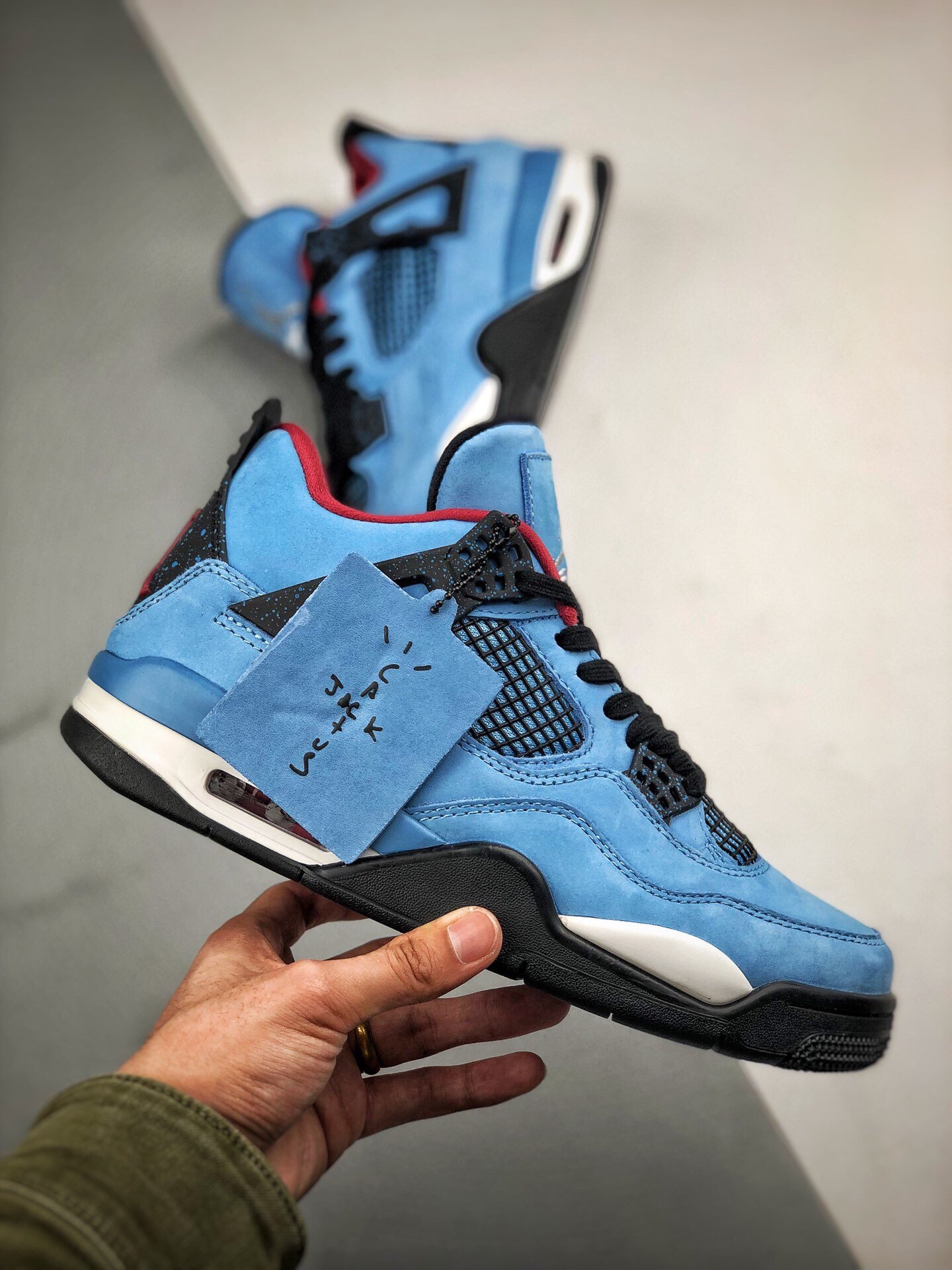 Travis Scott's X Air Jordan 4 Cactus Jack Oliers University Blue 3