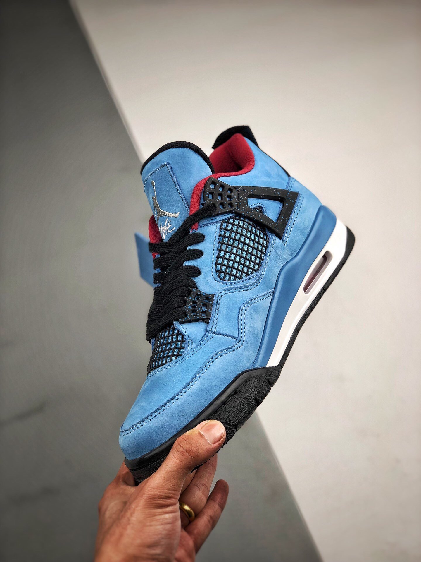 Travis Scott's X Air Jordan 4 Cactus Jack Oliers University Blue 5