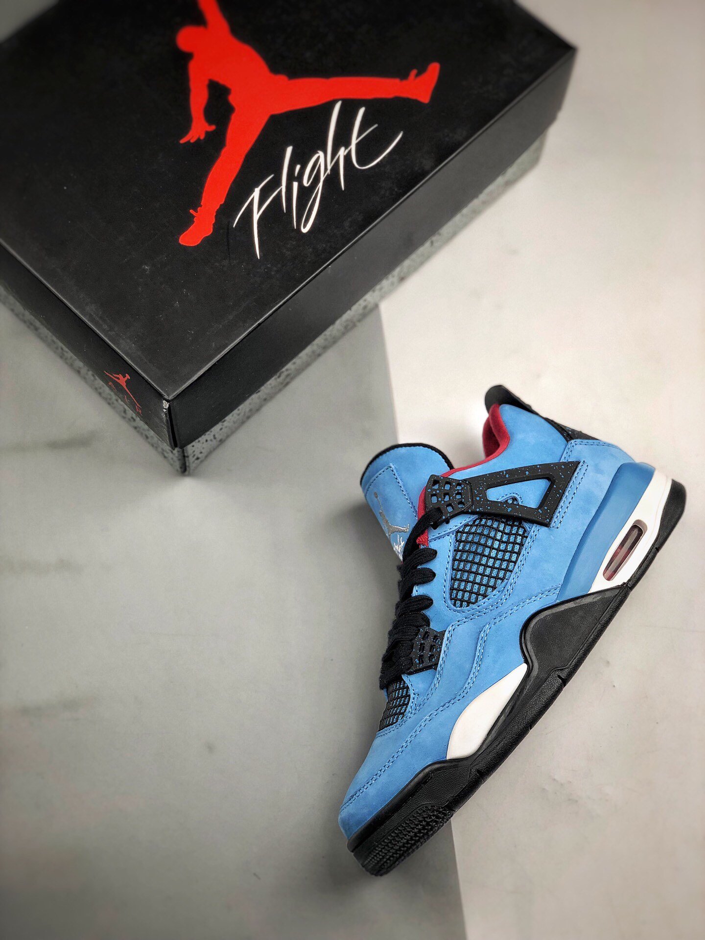 Travis Scott's X Air Jordan 4 Cactus Jack Oliers University Blue 7