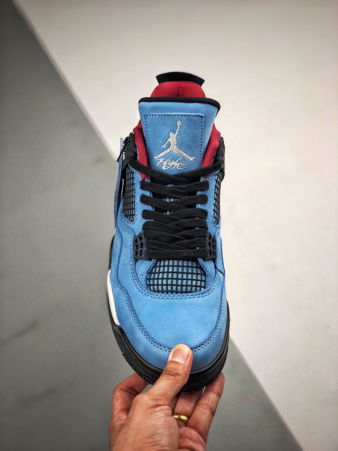 Travis Scott's X Air Jordan 4 Cactus Jack Oliers University Blue 17